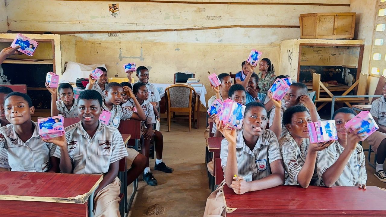 Cabfix Ladies deepen Menstrual Health Outreach with donation to girls at Cable and Wireless JHS • Sahara Football